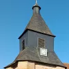 Toit de l'Église de Saint-Saulge et le logo de la paroisse Saint-Paul au cœur de la Nièvre