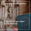 intérieur de l'église de Saint Saulge avec un roll-up au premier plan présentant le logo de la paroisse